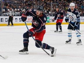 Columbus Blue Jackets centre Cole Sillinger (34) shoots against the Winnipeg Jets during the second period at Nationwide Arena.