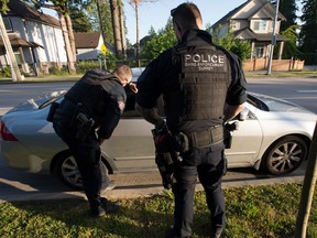 Members of the RCMP Gang Enforcement Team