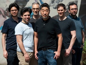 Handol Kim, third from right, with fellow co-founders of Variational AI: From left, Ahmad Issa, Mehran Khodabandeh, Marshall Drew-Brook, Jason Rolfe and Ali Saberali, in Vancouver on May 4.