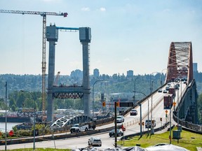 New Pattullo bridge under construction (left) next to the existing Pattullo bridge, as seen from New Westminster on May 10, 2023.