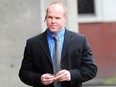 Former police officer Derek Brassington arrives at B.C. provincial court in 2013.