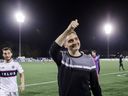 Vancouver Whitecaps coach Vanni Sartini celebrates the Whitecaps victory over the York United FC in the Canadian Championship quarterfinal soccer game in Toronto on Wednesday, May 10, 2023. 