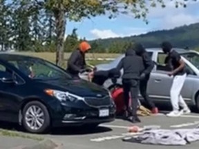 A still from a video of an attack in the parking lot of Stelly?s Secondary on June 10, 2022. GREATER VICTORIA CRIME STOPPERS VIA FACEBOOK