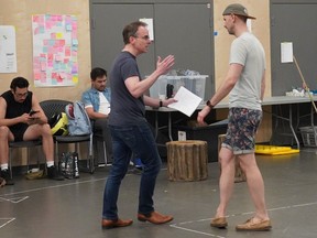 Director Daryl Cloran speaks with musical director and actor Ben Elliott at rehearsals for Bard on the Beach's As You Like It.