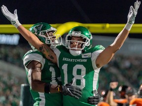 Saskatchewan Roughriders receiver Justin McInnis (18) celebrates his first career touchdown.