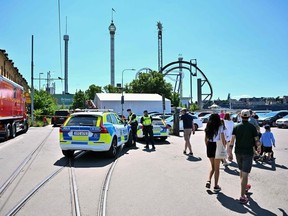 A photo taken on June 25, 2023 shows police at the Grona Lund amusement park, after an accident occurred in the 'Jetline' roller coaster leaving one person dead. A carriage in the 'Jetline' roller coaster has derailed and fallen from a height of several meters. One person died and several people have been injured, according to Swedish media reports on June 25. The amusement park is being evacuated and the police have set up cordons.