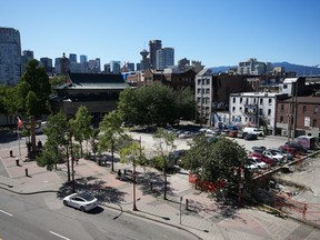 A parking lot that is the proposed site of a condo development in Chinatown is seen in Vancouver, on Tuesday, June 6, 2023. The hearing to determine the fate of a controversial condo project in Vancouver's Chinatown is resuming with almost 100 speakers scheduled to appear.