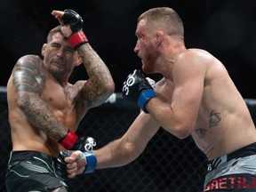 Justin Gaethje throws a punch against Dustin Poirier during their Lightweight fight at UFC 291 at the Delta Center July 29, 2023 at the in Salt Lake City, Utah.