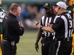 Edmonton Elks head coach Chris Jones argues a call.