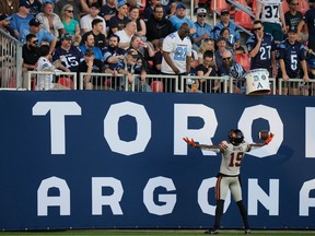 BC Lions wide receiver Dominique Rhymes (19) celebrates his touchdown catch as Toronto Argonauts fans look on during first half CFL action in Toronto on Monday, July 3, 2023.