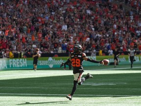 B.C. Lions' Jalon Edwards-Cooper celebrates after returning a blocked Montreal Alouettes field goal attempt for a touchdown during the first half of a CFL football game, in Vancouver, B.C., Sunday, July 9, 2023.