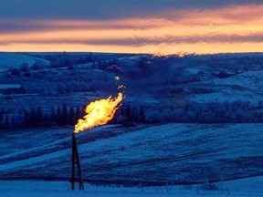 File photo of a flare burning excess natural gas. SFU researchers warn more efforts are needed to reduce methane emissions to limit warming to under 2 C.
