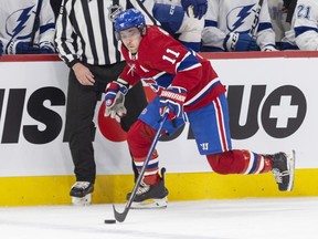 Montreal Canadiens Brendan Gallager skates with the puck during the first period against the Tampa Bay Lightning in Montreal on Tuesday March 21, 2023. It was Gallagher's first game back since being injured and missing 32 games.