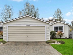 This Ladner home was listed for $948,800 and sold for $900,000.