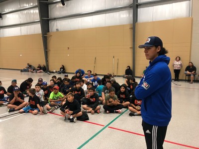 Canucks: Kids feel 'special' at Ethan Bear's Ochapowace hockey