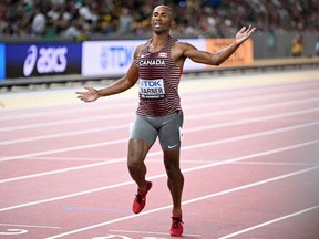 London's Damian Warner celebrates as he crosses the line to secure his silver medal after completing the men's decathlon 1500 metres at the World Athletics Championships in Budapest, Hungary, on Saturday, Aug. 26, 2023. (Photo by Kirill KUDRYAVTSEV / AFP)