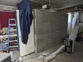 This undated photo provided by the Federal Bureau of Investigation's Portland Field Office shows a makeshift cinderblock cell in Klamath Falls, Ore. allegedly used by 29-year-old, Negasi Zuberi. Authorities say Zuberi who posed as an undercover police officer kidnapped a woman in Seattle, drove her hundreds of miles to his home in Oregon, and kept her in a makeshift cell from which she eventually escaped and found help. The FBI said Tuesday, Aug. 1, 2023, that police in Reno, Nevada, arrested Zuberi after he fled from his home in Klamath Falls, Oregon, where he had taken the Seattle woman.