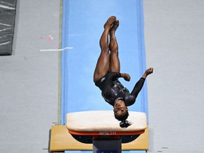 Gymnast Simone Biles practices the vault before competition on the final day of women's competition at the 2023 US Gymnastics Championships at the SAP Center on August 27, 2023 in San Jose, California. A total of 147 gymnasts have qualified to participate in the Championships, where they will compete for titles and a spot on the US National Team. (Photo by Loren Elliott / AFP)