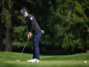 Yuka Saso, of Japan, makes a birdie putt on the seventh hole during the first round at the LPGA CPKC Canadian Women's Open golf tournament, in Vancouver Aug. 24, 2023.