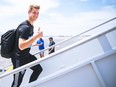 Whitecaps goalkeeper Isaac Boehmer boarding a plane