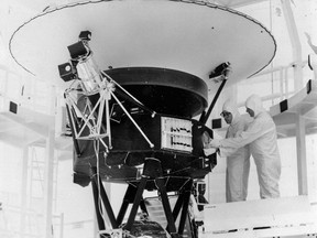 In this 1977 photo, the "Sounds of Earth" record is mounted on the Voyager 2 spacecraft prior to launch.