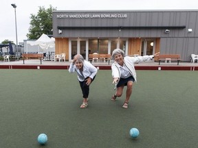It's the 100th anniversary of the North Vancouver Lawn Bowling Club. Pictured is club centennial chair and first vice-president Pat McKenzie (left) and club member Laura Gibson.
