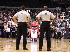 Toronto Raptors mascot performs during during first half of a pre-season NBA game against the Sacramento Kings at Rogers Arena in Vancouver, B.C. on Sunday October 5, 2014.