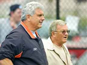 B.C. Lions Head Coach Wally Buono (left) and President and CEO Bob Ackles take in a practice on 2007.