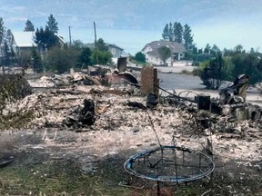 All that is left of the Traders Cove homes of Tiffany Genges and Elizabeth Twyman after the McDougall Creek wildfire passed through.