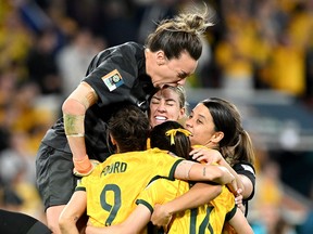 Mackenzie Arnold celebrates with her teammates after Cortnee Vine of Australia scores during the Women's World Cup at Brisbane Stadium on August 12, 2023 in Brisbane, Australia.