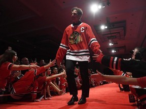 Chris Chelios is introduced to fans during the Chicago Blackhawks' convention in 2018.