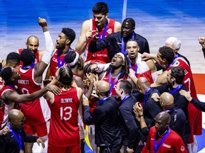 Canadian team celebrates after winning the FIBA Basketball World Cup third-place game against the U.S.