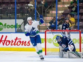Vancouver Canucks forward Vilmer Alriksson celebrates after teammate Aidan McDonough scored a power play goal in the second period against the Winnipeg Jets at the Young Stars tournament in Penticton on Sunday, Sept. 17, 2023.