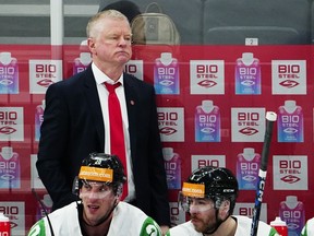 Hungary's head coach Kevin Constantine watches the group A match between United States and Hungary at the ice hockey world championship in Tampere, Finland, Sunday, May 14, 2023. The Western Hockey League says Wenatchee Wild head coach Kevin Constantine has been suspended after its independent reporting channel received a complaint about his conduct.