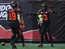 B.C. Lions' Alexander Hollins (13), Dominique Rhymes (19) and Keon Hatcher, back left, celebrate Hollins' touchdown against the Saskatchewan Roughriders in July. 