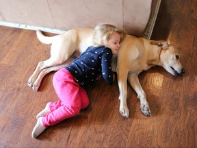 Pet Love girl sleeping with dog