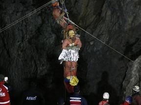 Rescuers pull American researcher Mark Dickey out of Morca cave near Anamur, south Turkey, on early Tuesday, Sept. 12, 2023. Teams from across Europe had rushed to Morca cave in southern Turkey's Taurus Mountains to aid Dickey, a 40-year-old experienced caver who became seriously ill on Sept. 2 with stomach bleeding.