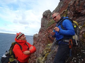 CSA astronaut David Saint-Jacques, left, and Dr. Gordon Osinski are shown on a field training expedition at West Clearwater Lake in northern Quebec in this 2014 handout photo. In a milestone moment for Canadian space science, planetary geologist Gordon "Oz" Osinski is hoping to "make Canada proud" after his appointment to a NASA team that will train the first person to walk on the moon in over 50 years.