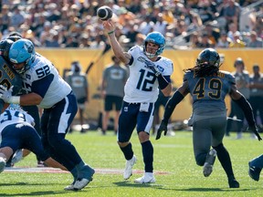 Toronto Argonauts quarterback Chad Kelly (12) throws during CFL action against the Hamilton Tiger-Cats in the annual Labour Day Classic in Hamilton, Ont. on Monday, September 4, 2023.