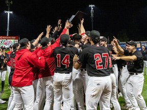 The Vancouver Canadians celebrate wining the Northwest League title Saturday night at Nat Bailey Stadium. It’s the franchise’s fifth crown since 2011.