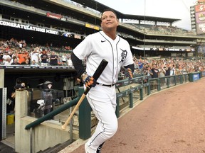 FILE - Detroit Tigers' Miguel Cabrera leaves the dugout to acknowledge the crowd as he is honored for his recent 500th career home run in the first inning of a baseball game against the Toronto Blue Jays, Aug. 27, 2021, in Detroit. Cabrera, one of the greatest hitters of all time, is retiring after the Tigers wrap up their season Sunday, Oct. 1, 2023, and baseball's last Triple Crown winner is leaving a lasting legacy in the game and his native Venezuela.