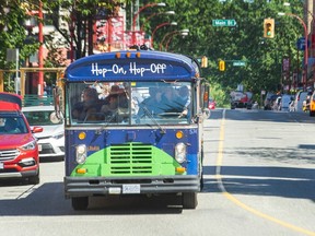 VANCOUVER, BC - August 8, 2022 - Hop On Hop Off bus on Keefer at Columbia in Vancouver, BC., August 8, 2022. Story on Vancouver tourism alerts. Tourist have been warned about random violence in areas like Chinatown and Gastown. (Arlen Redekop / PostMedia staff photo) (Story by reporter) [PNG Merlin Archive]