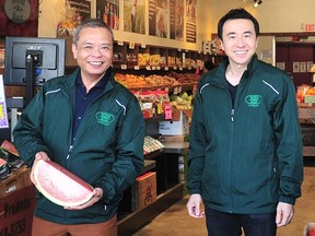 In Richmond on Sept. 5., Victor Lau, right, COO at Kin's Farm Market, and Kin Wah Leung, one of the son's of the founders, are ready to celebrate the company's 40th anniversary.