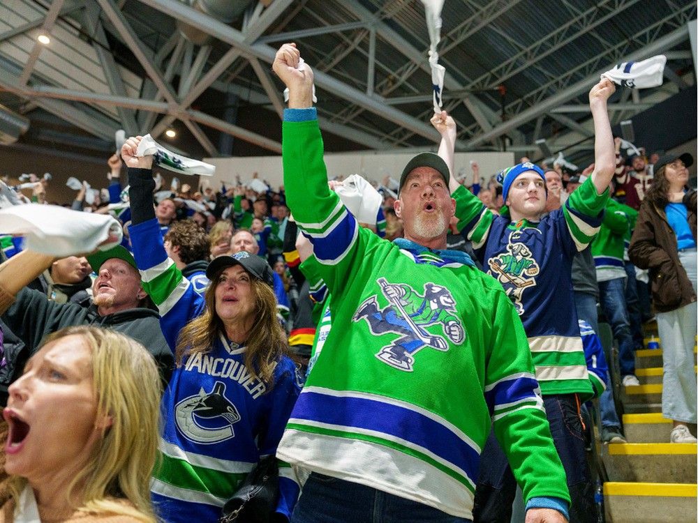 One Direction show their support for San Jose Sharks as they take to the  stage in ice hockey team's shirts