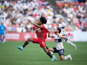Toronto FC hosts the Vancouver Whitecaps on Saturday as both teams return to action after the international break. Toronto FC's Jayden Nelson (11) and Vancouver Whitecaps' Russell Teibert (31) vie for the ball during the first half of the Canadian Championship soccer final, in Vancouver, on Tuesday, July 26, 2022.