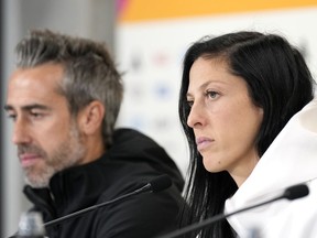 FILE - Spain's Jennifer Hermoso, right, and head coach Jorge Vilda listens to reporters questions during a press conference at Eden Park ahead of the Women's World Cup semifinal match between Spain and Sweden in Auckland, New Zealand, Monday, Aug.14, 2023. Jenni Hermoso said Friday, Aug. 25, that 'in no moment' did she consent to a kiss on the lips by soccer federation president Luis Rubiales. Hermoso issued a statement through her union hours after Rubiales claimed in an emergency meeting of the Spanish soccer federation that the kiss was consensual.
