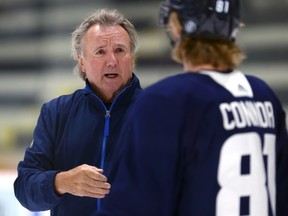 Head coach Rick Bowness speaks with Kyle Connor during Winnipeg Jets training camp on Thursday, Sept. 21, 2023.