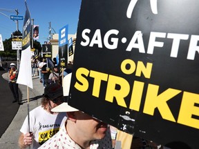 Striking SAG-AFTRA members and supporters picket outside Paramount Studios this week in Los Angeles.