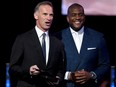 Former NHL goaltenders Dominik Hasek (L) and Kevin Weekes present the Vezina Trophy during the 2016 NHL Awards in Las Vegas. Weekes and co-host John Buccigross begin their new 'whip-around' studio show Frozen Frenzy on ESPN on Tuesday night.
