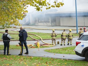 Port Coquitlam firefighters put out a fire at Hazel Trembath Elementary on Oct. 14. The overnight fire destroyed much of the school.